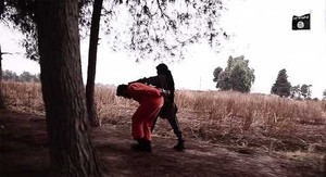 IS tung video 'đao phủ nhí' cắt cổ tù nhân Syria và đe dọa Mỹ