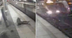 Clip: Kinh hoàng khoảnh khắc tàu hỏa húc bay 2 người lên không trung