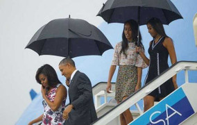 Cái ô của Obama và cái ô của người Việt