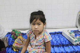 Phẫu thuật thành công, bé gái 'người vượn' xuất viện