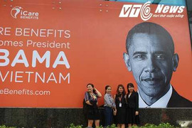 Dân Sài Gòn treo ảnh chào đón Tổng thống Obama