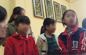 Dân vây bắt kẻ dụ dỗ 2 bé gái tiểu học đi nhà hàng