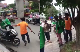 Tranh giành khách, lái xe ôm cầm gậy đuổi đánh tài xế Grabbike trên phố Hà Nội