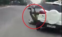Truy tìm tài xế lái ôtô húc văng cảnh sát trước cổng Bệnh viện Bạch Mai