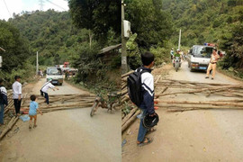 Công an triệu tập những kẻ quá khích mang cây củi chặn xe CSGT Sơn La 'đòi' lại xe vi phạm