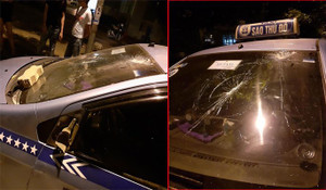 Cho rằng bị 'chặt chém', nhóm người nước ngoài hành hung tài xế, đập phá taxi ở Hà Nội