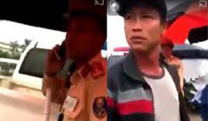 Người đàn ông cầm bộ đàm đánh dân quay clip CSGT là ai?