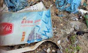 Phát hiện thêm hàng trăm tấn rác thải có chữ Trung Quốc đổ trong rừng