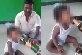 Mẹ quay clip bố ép con 10 tháng tuổi uống bia gây phẫn nộ