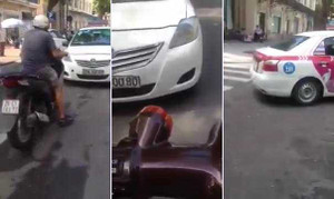Taxi chạy ngược chiều bị SH ép lùi hàng chục mét