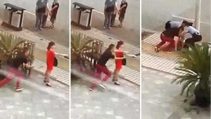 Cảnh sát 'hạ gục' cô gái cầm dao thái thịt dọa tự tử