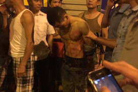 Tên cướp cắt cổ lái xe taxi bị dân vây bắt khai gì?