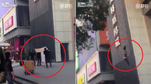 Cảnh sát Trung Quốc 'hứng' người phụ nữ tự tử bằng... gỗ ván