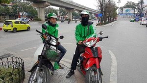 Chạy GrabBike ngày Tết, tài xế mỗi ngày kiếm 2 triệu đồng