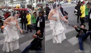 Clip: Không chịu đến đám cưới, chú rể bị cô dâu xích tay, lôi xềnh xệch giữa phố đông