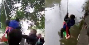Video: Ép học Toán, bố treo con lơ lửng trên sông