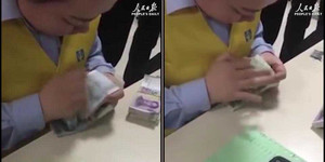 Choáng với clip cô gái Trung Quốc đếm tiền nhanh hơn máy