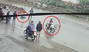 Sau tai nạn, cô gái thản nhiên phóng xe đi, bỏ nạn nhân bất tỉnh trên đường mưa