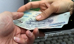 Tạm giữ người xưng nhà báo nhận tiền 'chạy án'