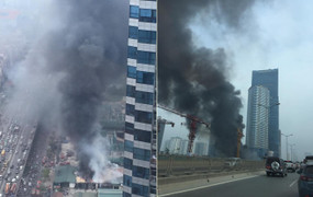 Cột khói đen cao hàng chục mét trong đám cháy ở đường Phạm Hùng, Hà Nội