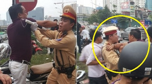 Đi vào làn BRT, người trên ô tô hung hăng đánh tài xế xe máy: CSGT nói gì?