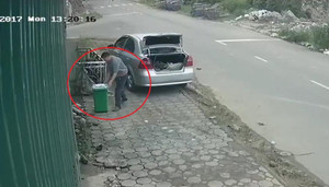 Đi xe hơi, dừng lại ăn cắp cả thùng đựng rác bỏ vào cốp