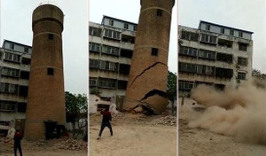 Khoảnh khắc kinh hoàng ống khói khổng lồ đổ sập, chôn vùi công nhân