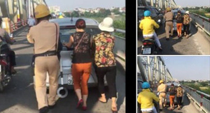 CSGT đội nắng giúp dân đẩy ô tô chết máy gây ấn tượng