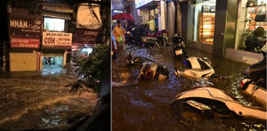 Những hình ảnh 'độc' trong cơn mưa như trút nước ở Hà Nội