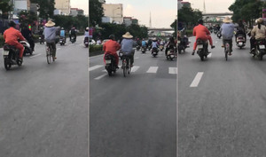 Đạp xe buông cả 2 tay như làm xiếc trên phố và cái kết siêu hài