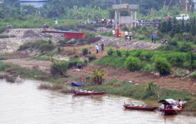 Công an nổ súng vây bắt, người đàn ông lao xuống sông mất tích
