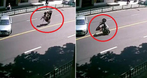 Xe máy chở ba người lộn nhào sau cú phanh gấp và cái kết bi hài