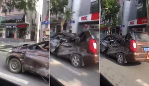 ‘Siêu xe đồng nát’ bẹp dúm vẫn chạy bon bon trên phố