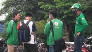 Grab bác tin tài xế GrabBike mang súng thanh toán 'xe ôm' truyền thông