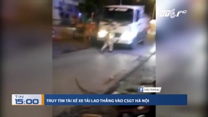 Truy tìm tài xế xe tải lao thẳng vào CSGT Hà Nội