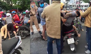 Video: Nam thanh niên vi phạm giao thông, rút dao đe dọa cảnh sát để 'giải cứu' bạn gái