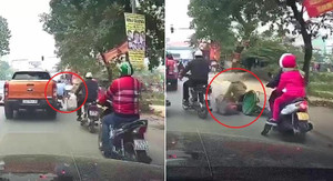 Clip người đàn ông giơ chân gạt ngã phụ nữ đi xe đạp gây phẫn nộ