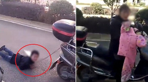 Clip: Mẹ trói tay con trai vào xe máy kéo lê trên đường