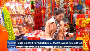 Cả dãy phố dài dằng dặc đỏ rực hàng mã trước ngày ông Công ông Táo