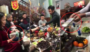 Clip bà mẹ 'chịu chơi' lì xì con cháu cả xấp tiền 500.000 đồng gây xôn xao dân mạng