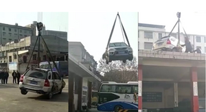 Clip: Nghênh ngang đỗ giữa trạm xe buýt, ô tô bị cẩu thẳng lên mái nhà