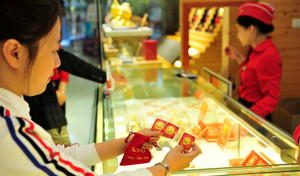 Giá vàng biến động ngày vía Thần Tài