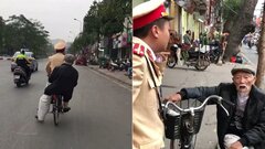 Clip chiến sỹ CSGT đạp xe đèo cụ ông bị lẫn về nhà gây sốt mạng xã hội