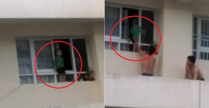 Thót tim clip bé trai trèo ra khỏi cửa sổ tầng 11 chung cư ở TP.HCM