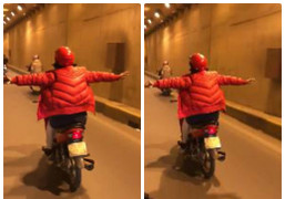 Clip: Phụ nữ lái xe máy buông cả 2 tay ở Hà Nội khiến người đi đường thất kinh