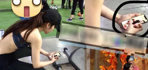 Nam Em tay cầm điện thoại xem ảnh Trường Giang?