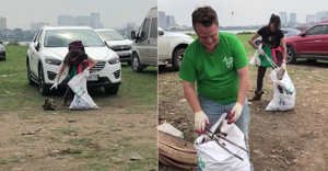 Clip 2 khách Tây cặm cụi nhặt rác ở Phủ Tây Hồ khiến nhiều người Việt xấu hổ