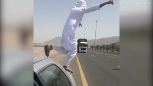 Video: Người đàn ông mang tính mạng ra đùa giỡn trước đầu xe tải