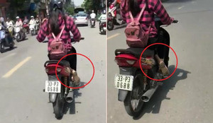 Clip: Hoảng hồn nữ 'ninja' lái xe máy vắt chéo chân để tránh nắng