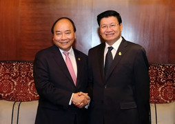 Việt Nam - Lào cam kết đẩy mạnh các dự án hợp tác trọng điểm